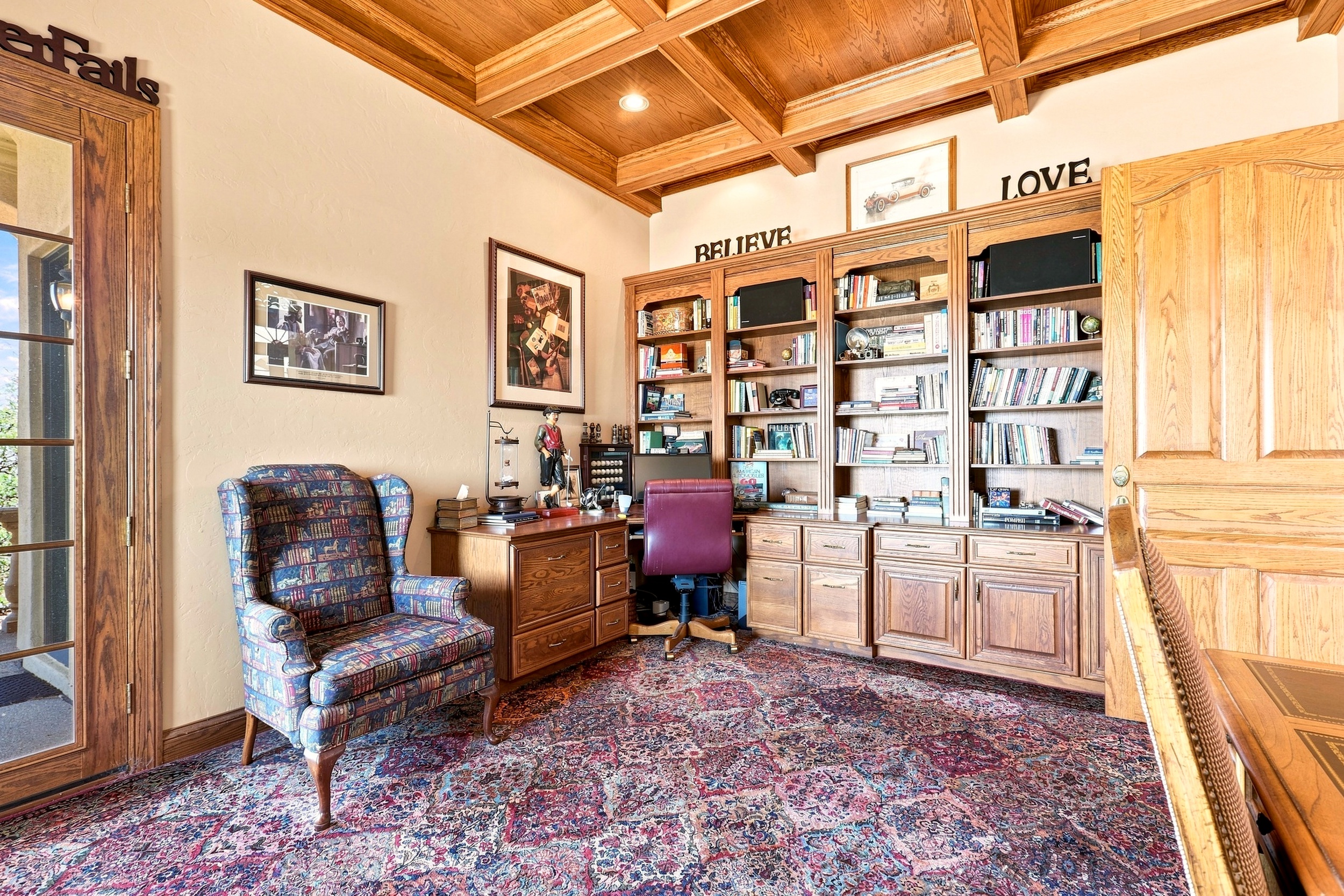 Aerial view of 8850 N Glenhurst Place showing the residence, pool and surrounding Sonoran Desert